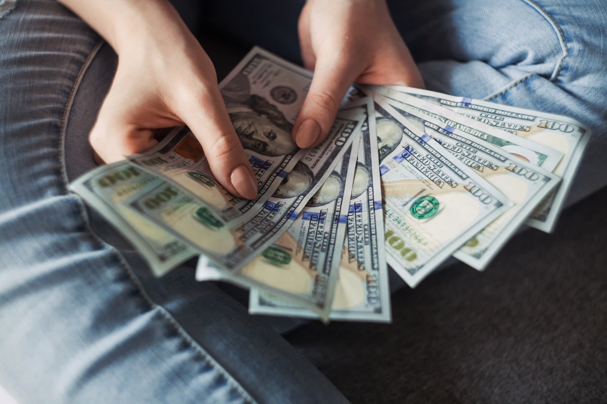Smartphone shopping app showing installment payment options at checkout — buy now pay later debt
